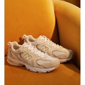 Beige New Balance. Worn once.